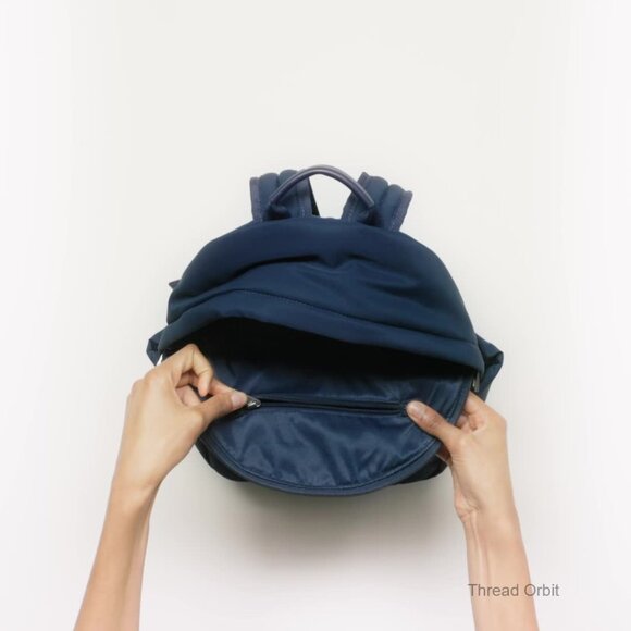 Small Quilted Backpack with Adjustable Straps and Multiple Pockets